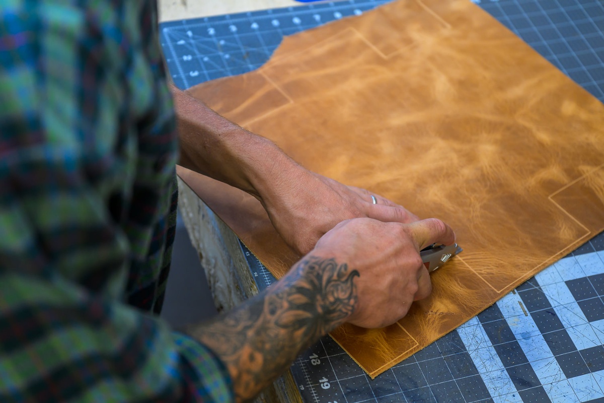 Cutting out a pattern.