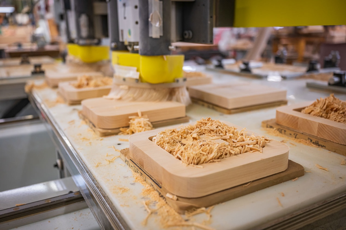 A CNC machine routing cutting boards.