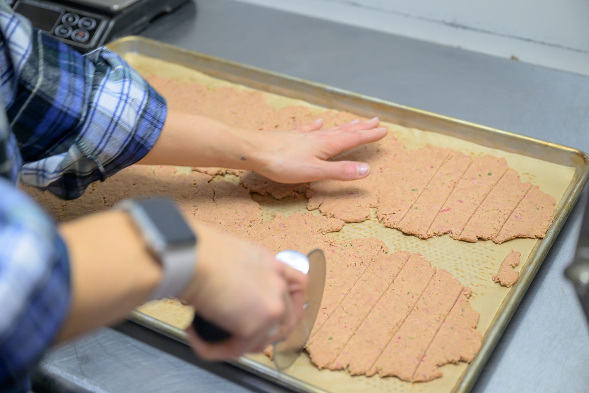 Cutting up treats.<br>