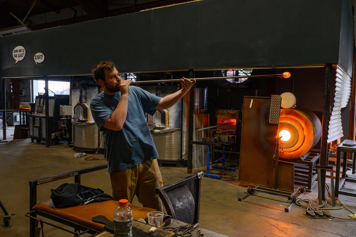 Blowing glass.<br>